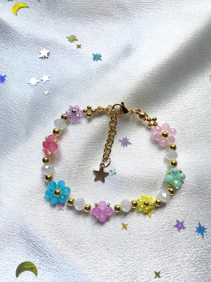 Colorful springtime dainty crystal flower daisy beaded bracelet with 18k gold beads perfect for any occasion and the perfect gift for birthdays, mothers day, christmas, valentines etc.