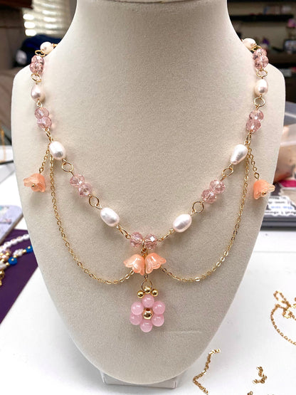 Beautiful Handmade Pink Rose Quartz Natural Stone Crystal Freshwater Pearl Necklace with hanging glass lillies and 18k gold beads and chain perfect gift for spring and birthdays for her and friends