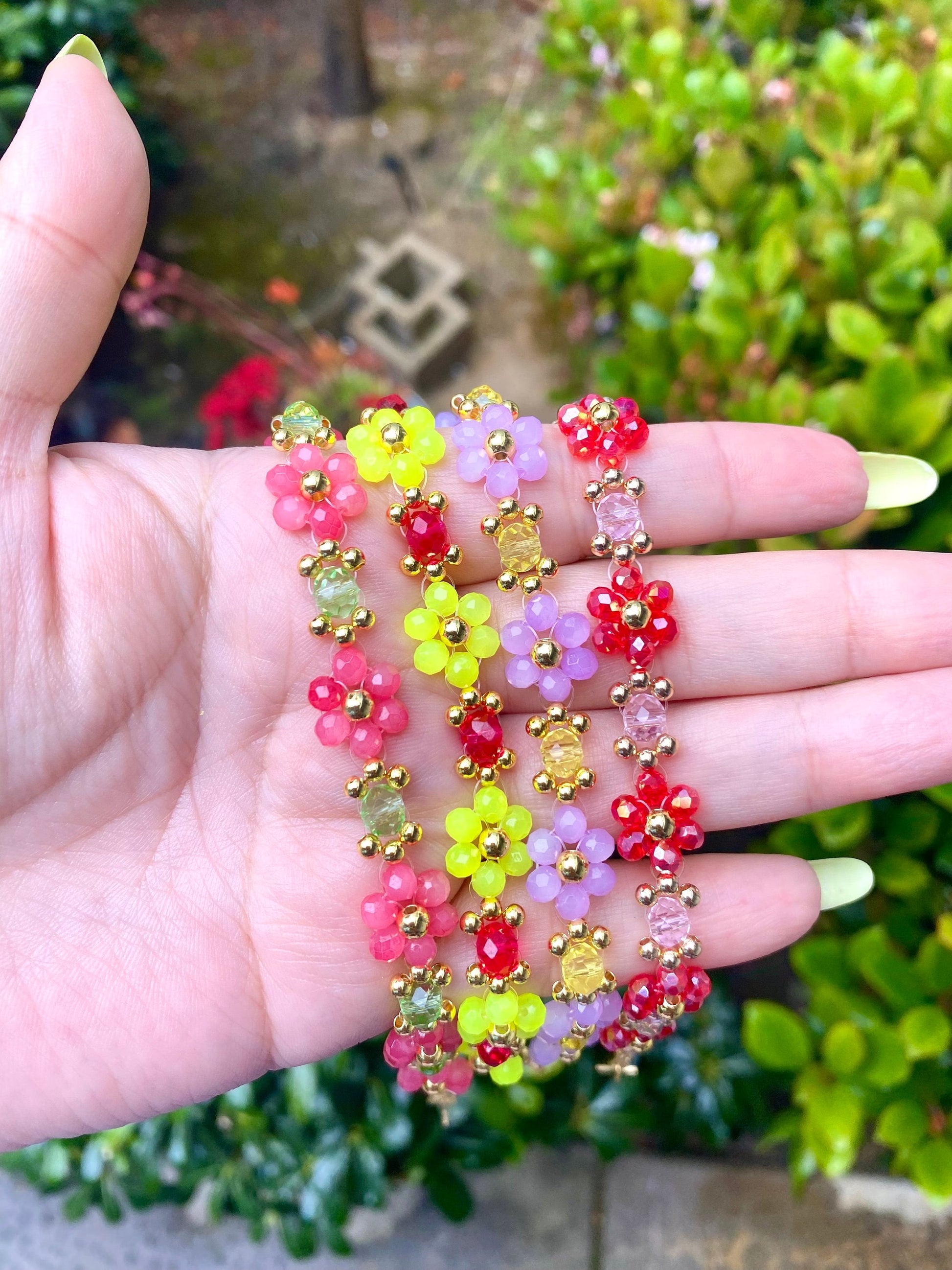 Make your own custom flower daisy crystal beaded bracelet 30+ colors available perfect gift for any loved one for her birthday, christmas, mothers day, etc. Bright beautiful colors and 18k gold filled beads and chain, tarnish resistant