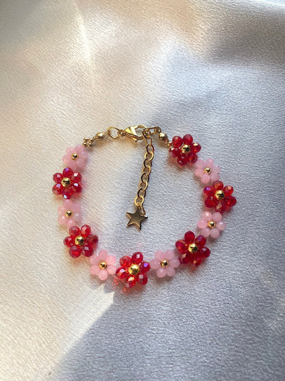 Pretty pink and red valentine flower crystal beaded bracelet with 18k gold beads. Crystal flowers are a pastel pink and a shiny red. Perfect gift for all occasions; christmas, valentines, birthdays, mothers day