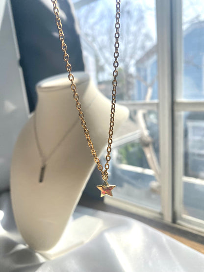 Showing an 18k Gold plated Star pendant necklace perfect gift for any friend or special person in your life. Perfect gift for a birthday or christmas or any holiday!