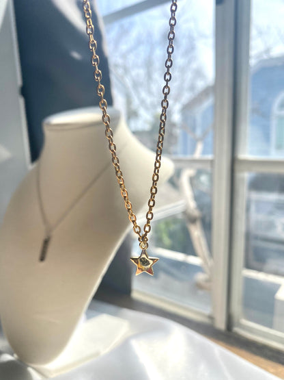 Showing an 18k Gold plated Star pendant necklace perfect gift for any friend or special person in your life. Perfect gift for a birthday or christmas or any holiday!