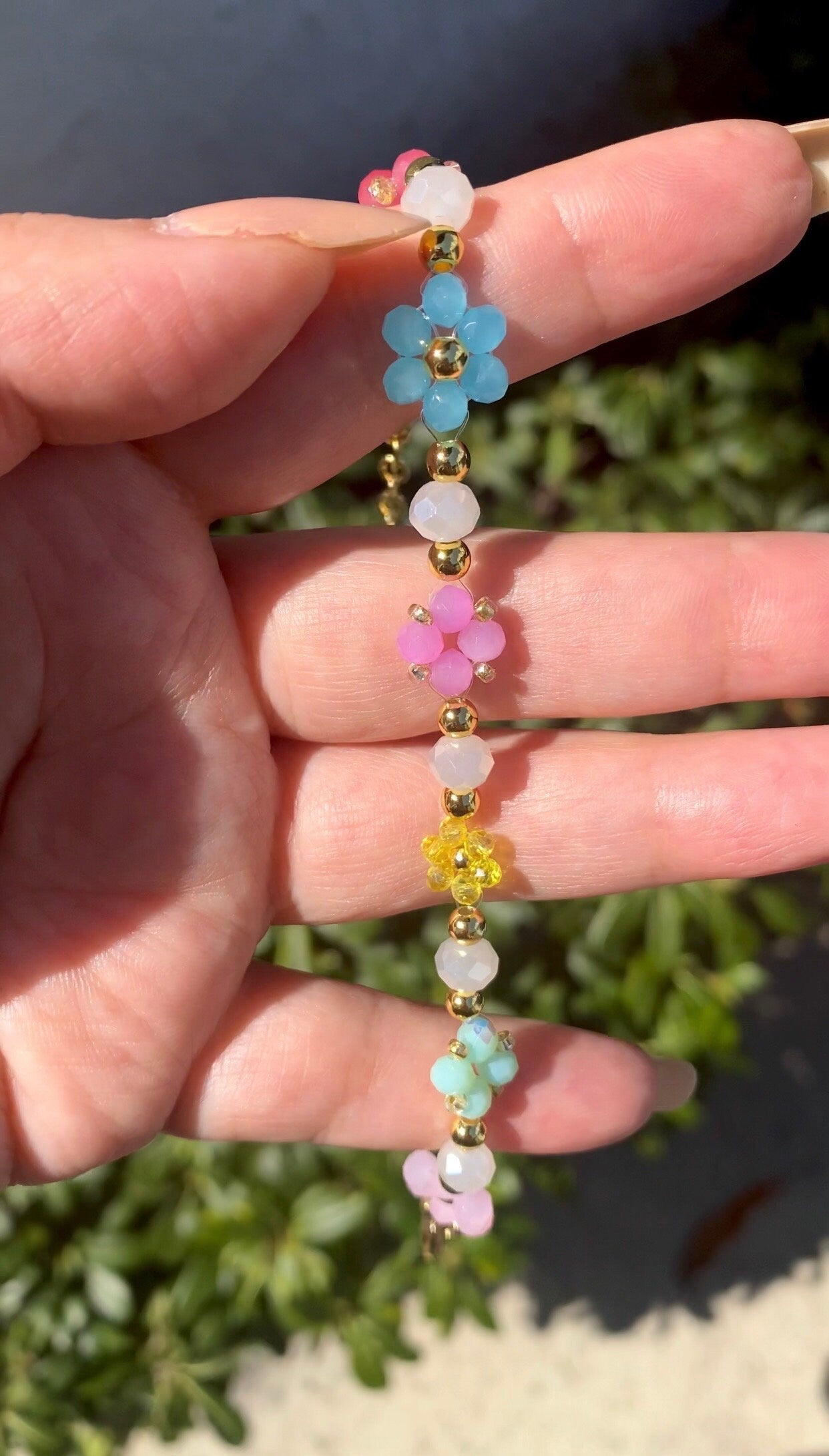 Colorful springtime dainty crystal flower daisy beaded bracelet with 18k gold beads perfect for any occasion and the perfect gift for birthdays, mothers day, christmas, valentines etc.