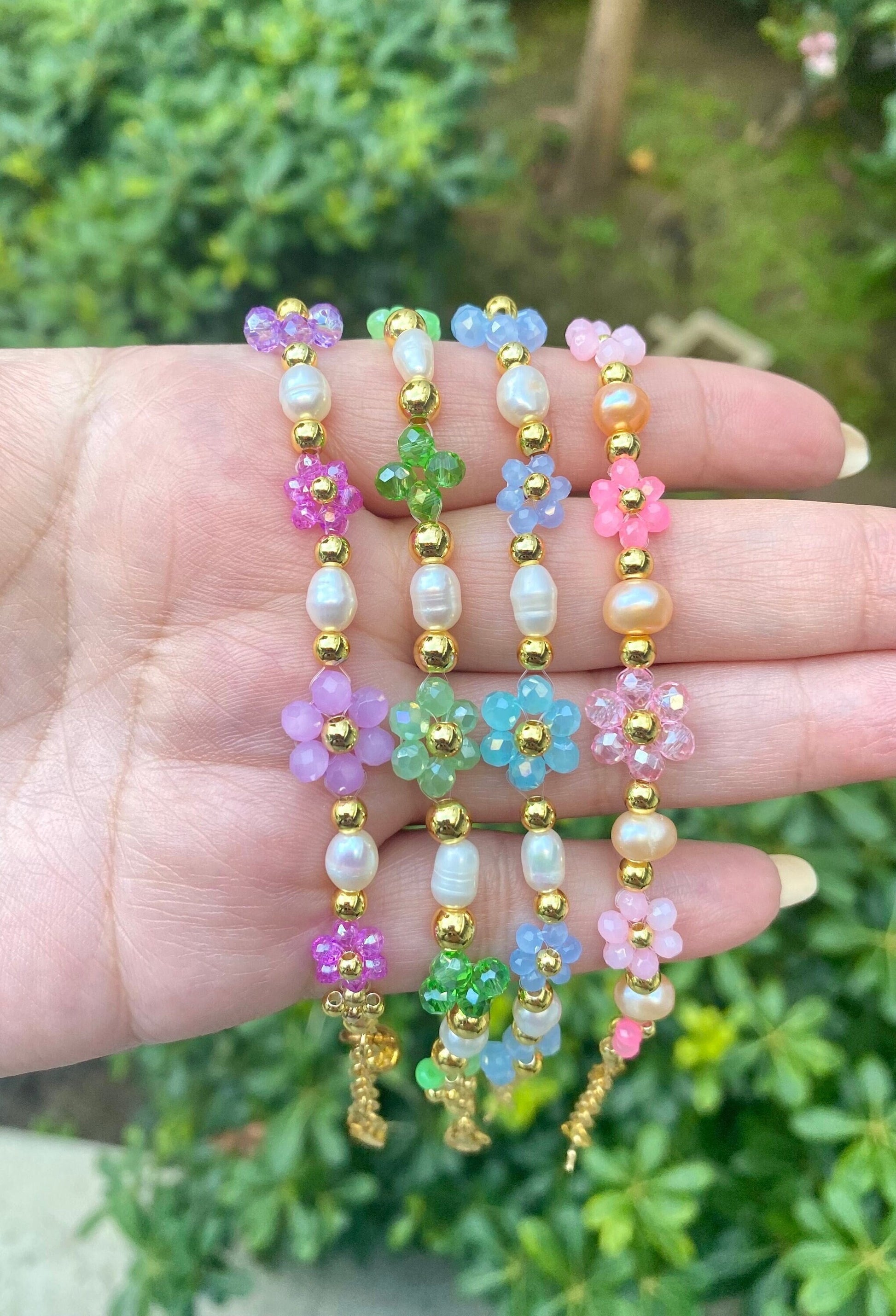 18k Gold Daisy Flower Crystal Beaded Bracelets with Freshwater Pearls in Purple, Green, Blue, and Pink cute perfect gift for birthdays, christmas, and any occasion! Tarnish resistant